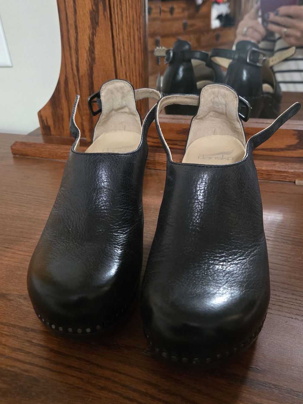 Dansko Black Leather Slingback Clogs with Studded Trim
